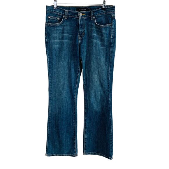 Calvin Klein Size S8 L32 Women's Mid Rise Flare Jeans Faded Blue Pockets - Picture 1 of 9